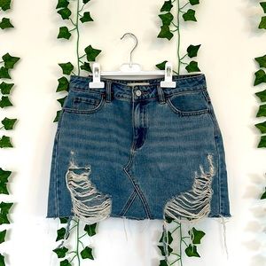This is a cute Jean skirt, it has rips, and it is super cute.